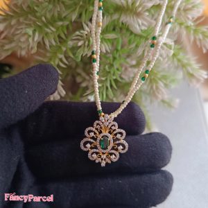 REGAL PEARL AND EMERALD MANGALSUTRA - Image 1